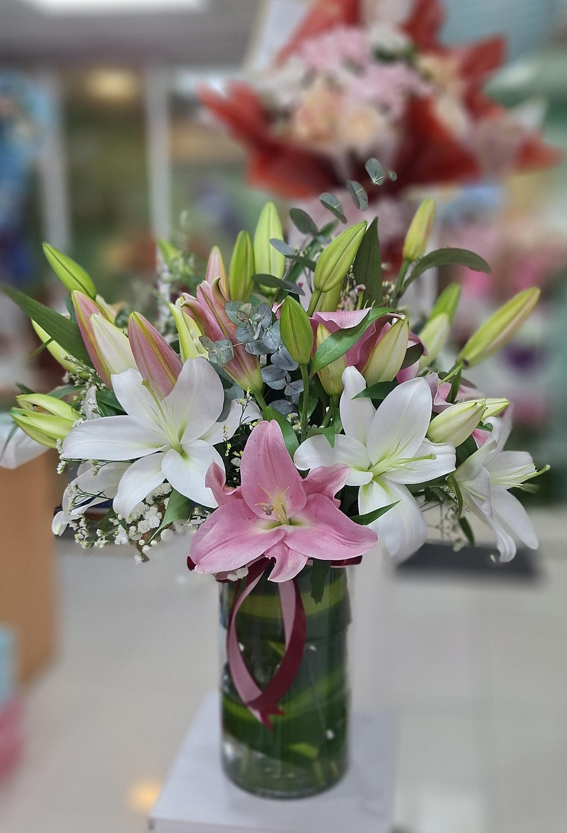 Elegant Pink & White Lily Vase Arrangement - FlowerSouq